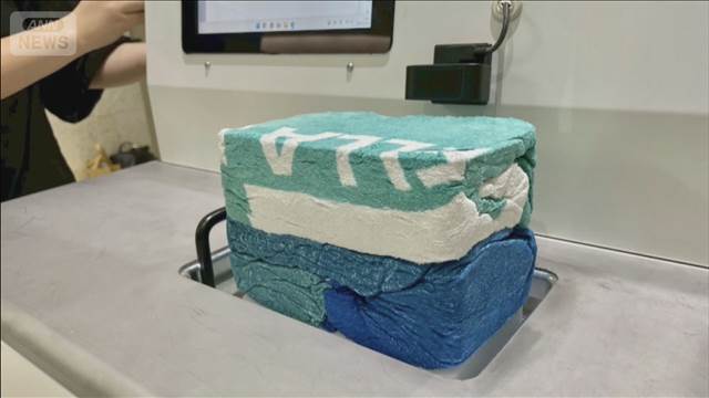 成田空港がスーツケース放置解消で衣類圧縮機を実験導入　1分で最大7分の1に