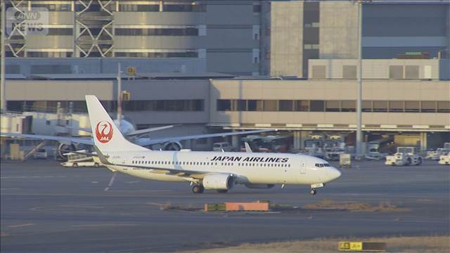 逮捕されたスカウトグループ「ナチュラル」会長が羽田到着　都内の警察署に移送へ