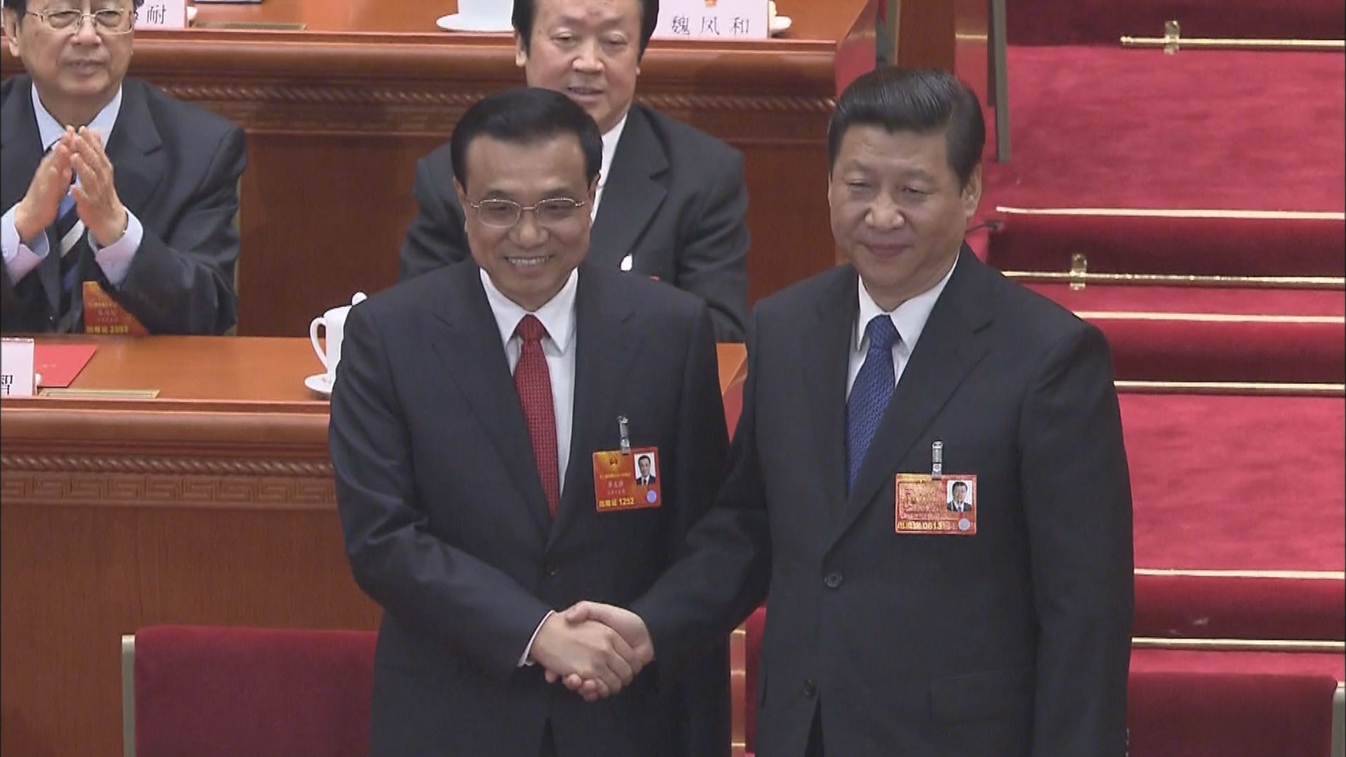 習政権発足当初の習近平氏と李克強氏の握手