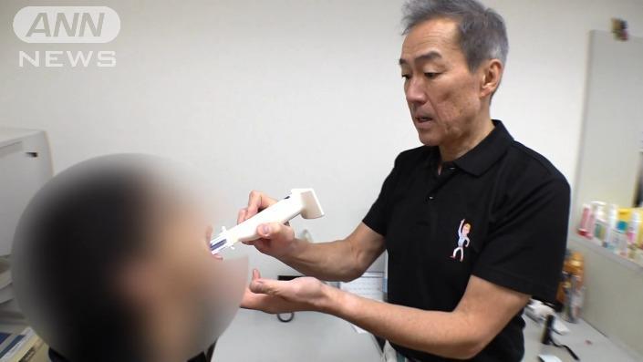 カメラでのどを撮影