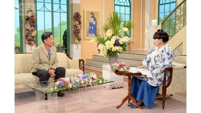 夫の夢を信じ続けた妻の献身を称えていた